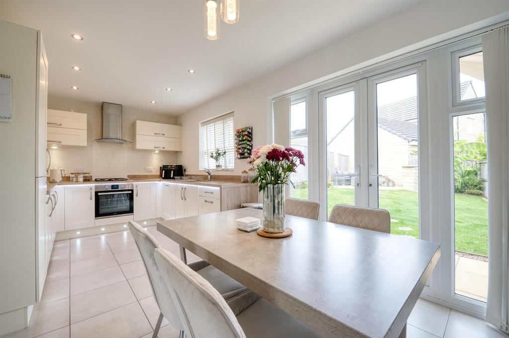 Dining area to kitchen and garden BIR 202108 LT01.