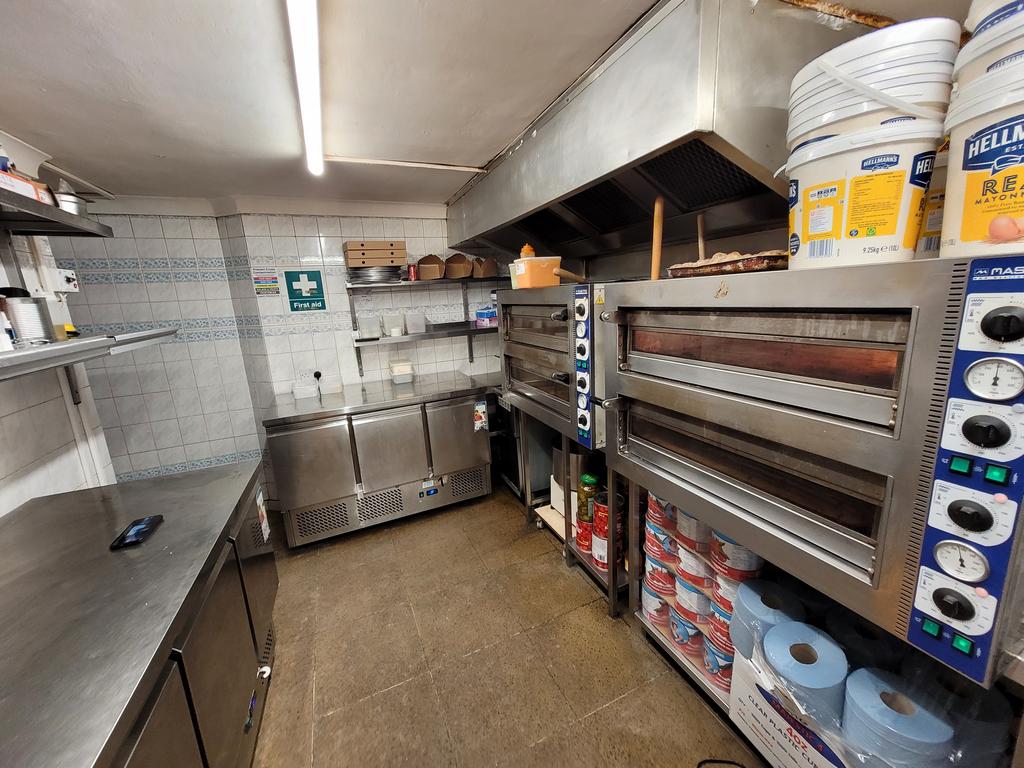 Open Plan Kitchen and Storage Area