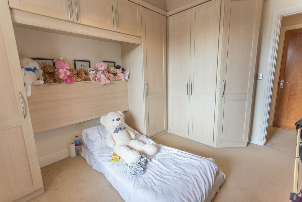 Bedroom 2 with wardrobes
