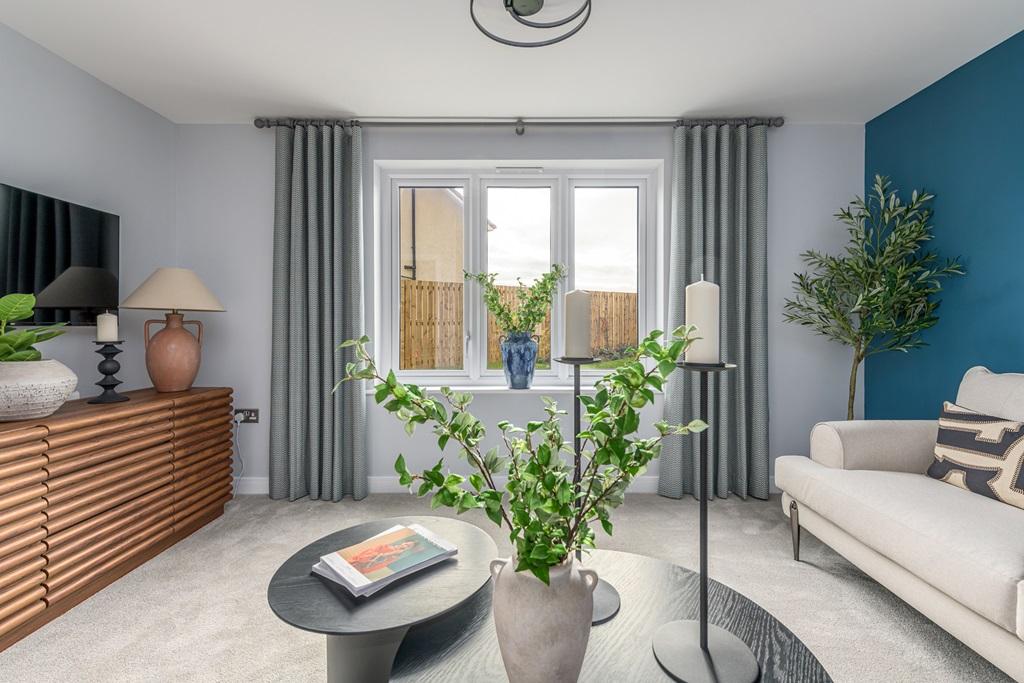 The living room is flooded with natural light