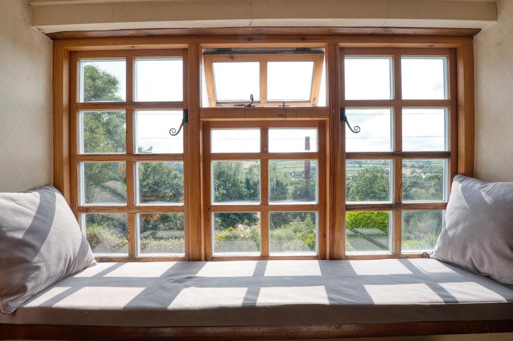 Bedroom One - window seat and view.jpg