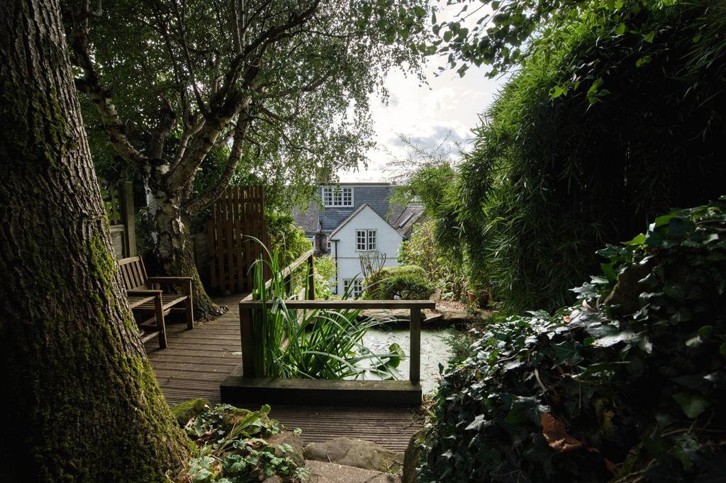Garden - pond and seating towards home.jpg
