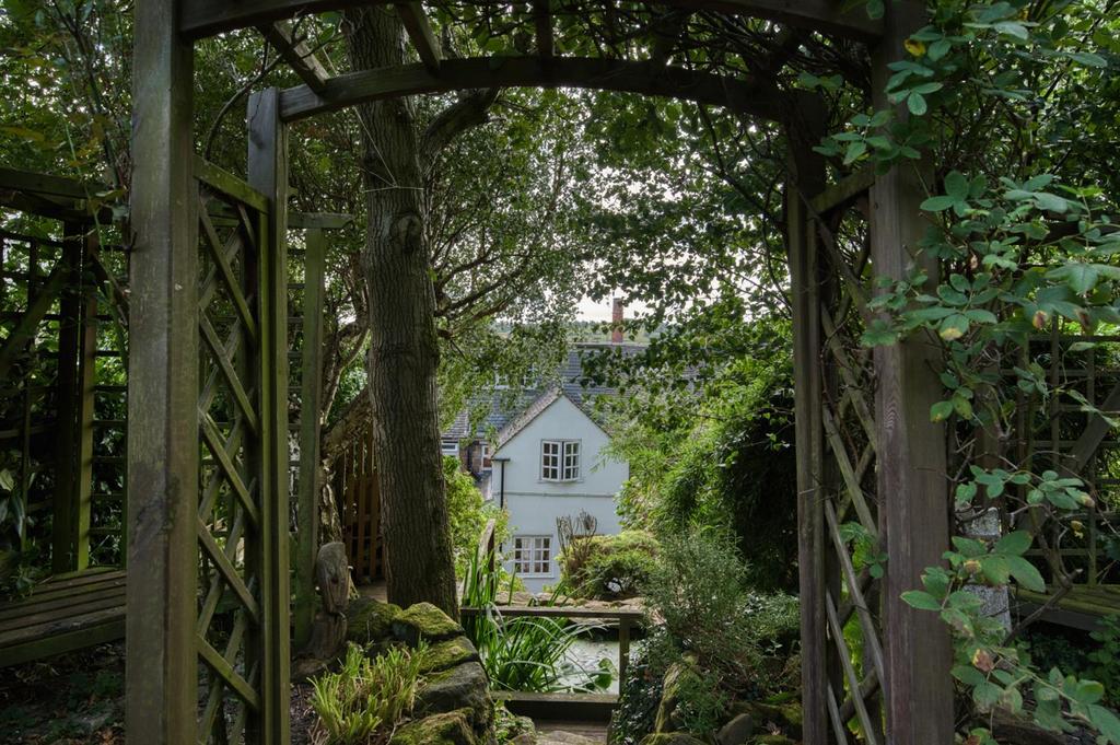 Rear of the home from upper garden.jpg
