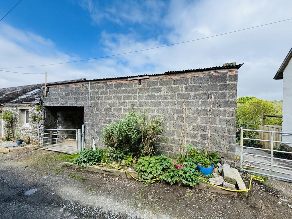 Adjoining block built stables