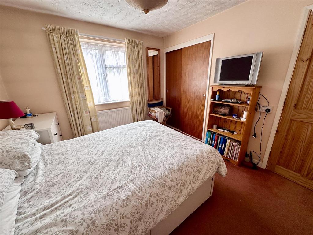 Bedroom with walk in wardrobe