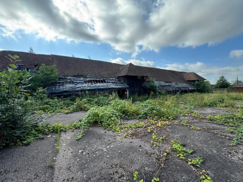 The long barn facing west