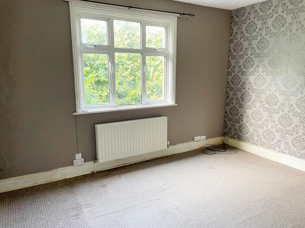 Living room with view to front of property