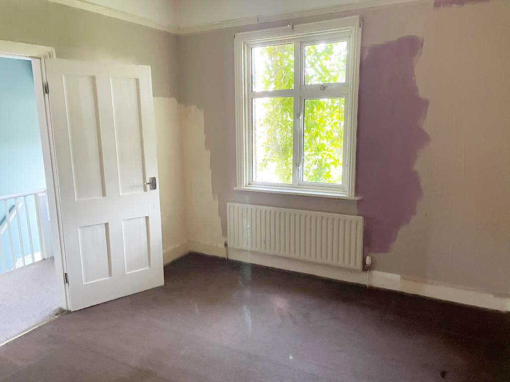 Main bedroom with view to rear of property