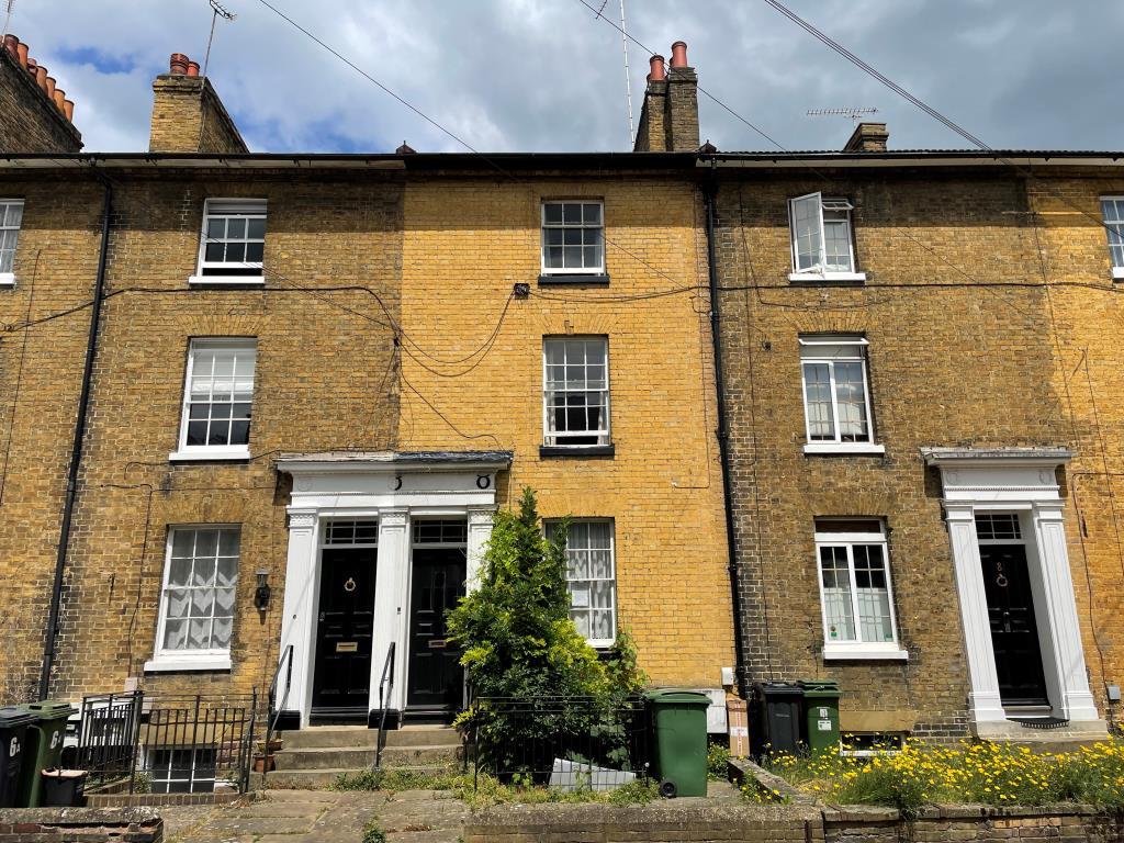 Yellow brick mid terrace property
