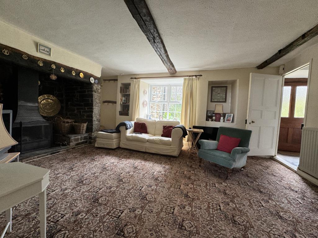 Sitting room with inglenook fire place