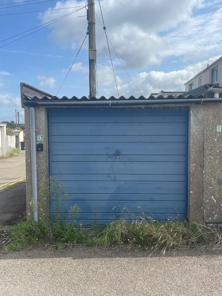 End terrace garage with blue door