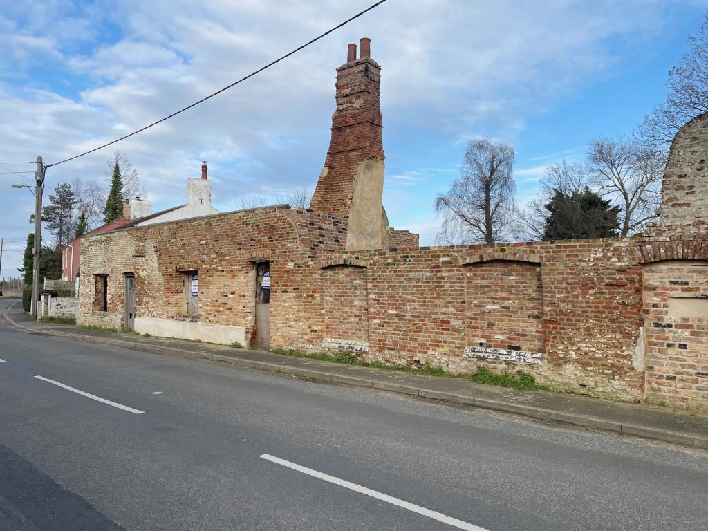 Street view of the cottage renovation project in F