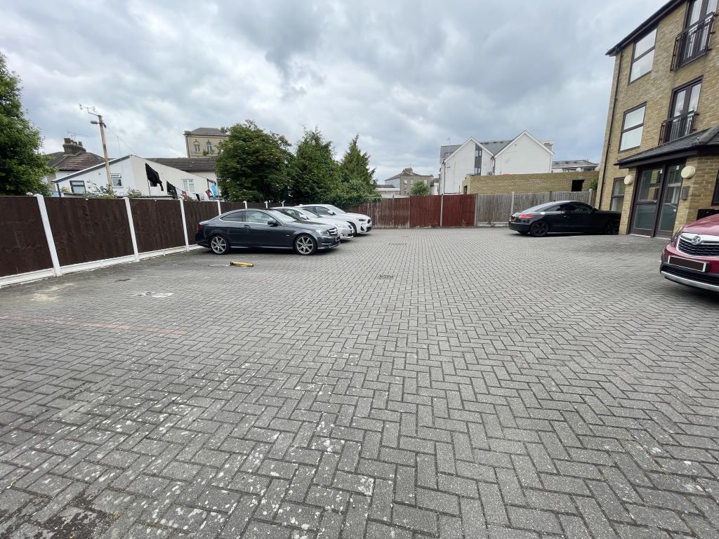 Outside image of parking area from gate