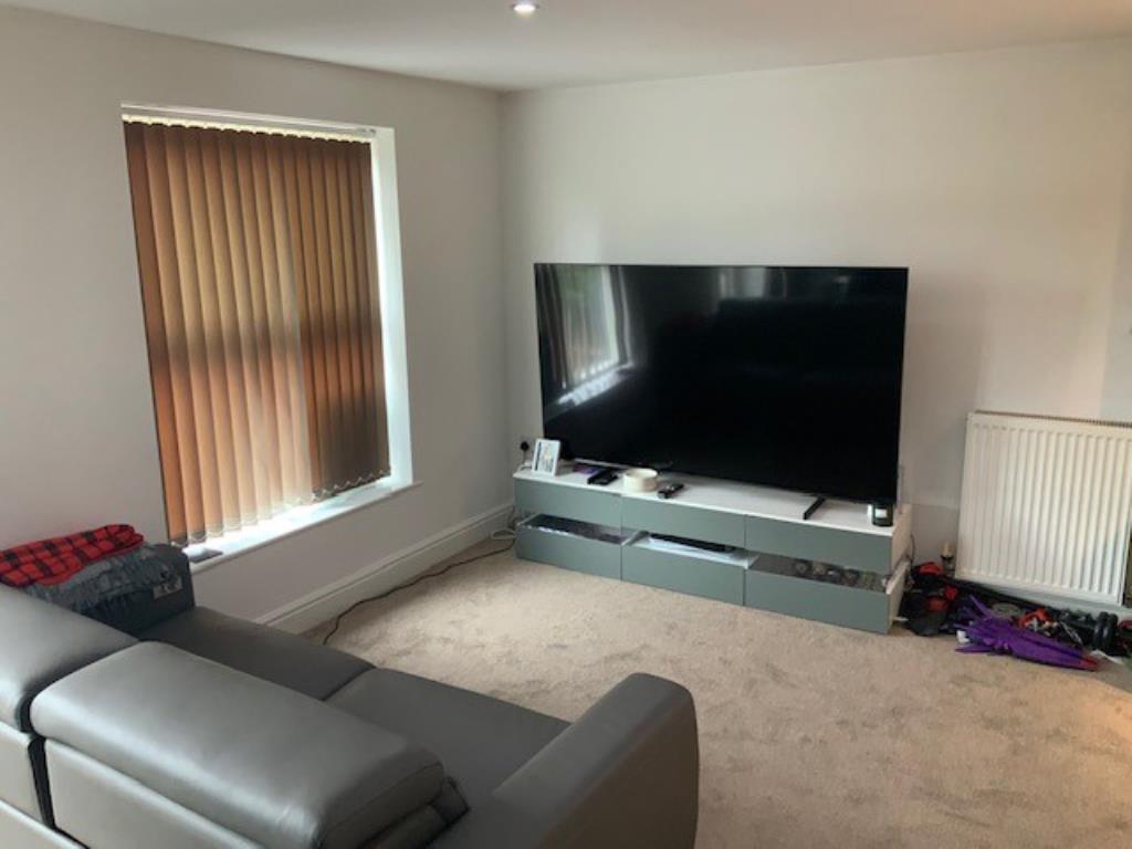 Living room to one of the flats