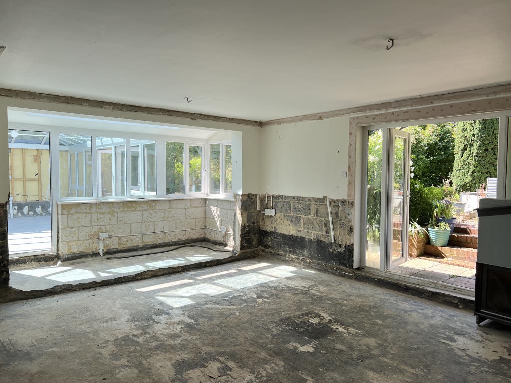 Kitchen and diner looking to conservatory of main