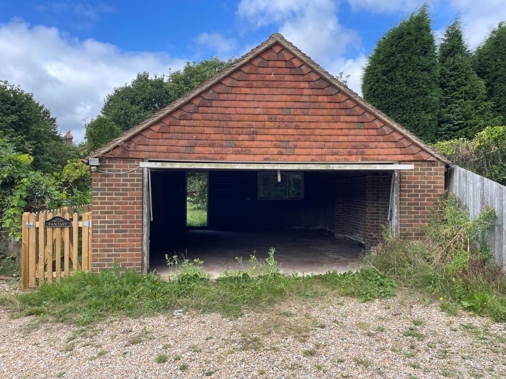 Front view of detached brick built double garage