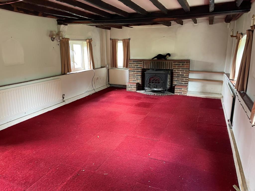 Living room with beams to front