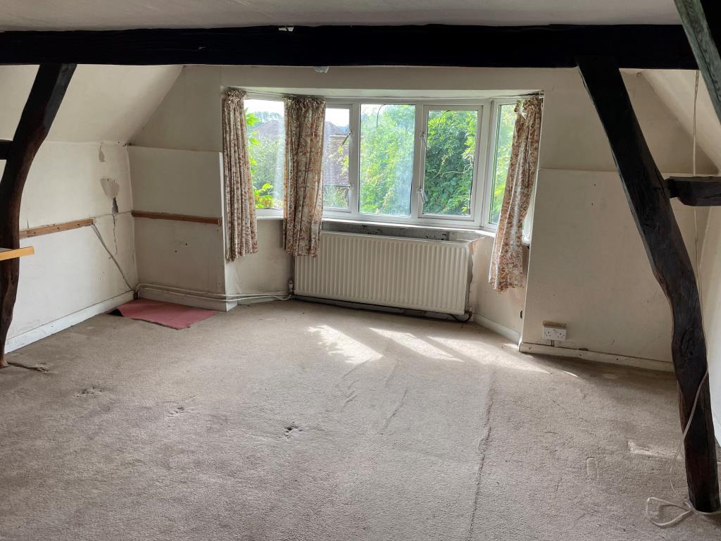 Main bedroom to rear with beams