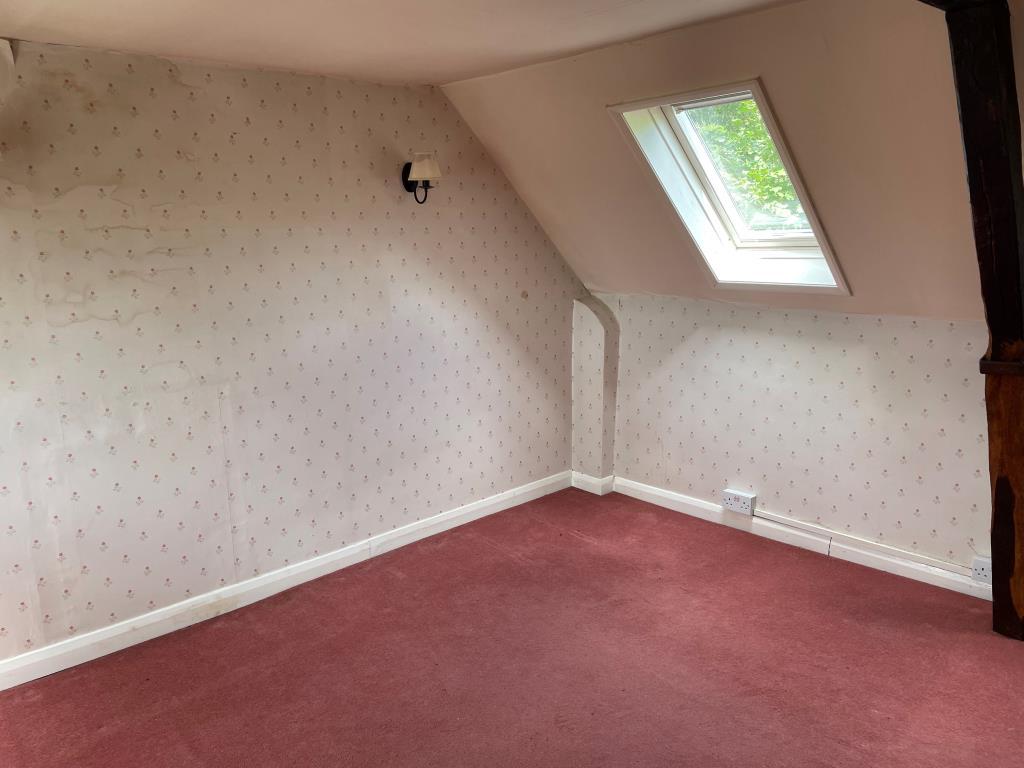 Bedroom 2 to front with Velux window