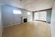 Living area with opening to dining area