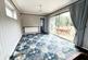 Dining space with sliding patio doors opening to r