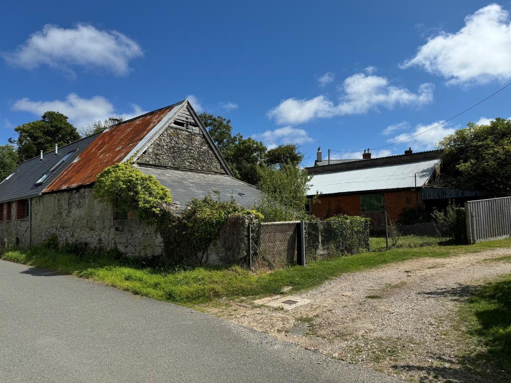 A View of Both Barns from the Road