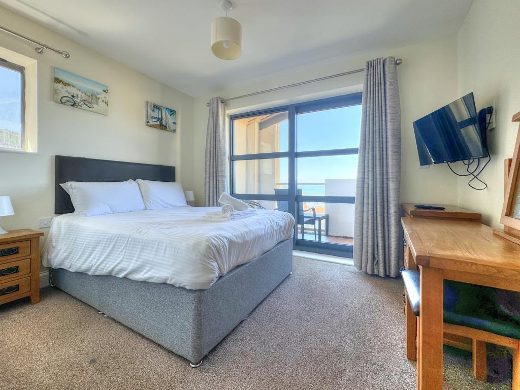Primary Bedroom with Balcony Sea Views
