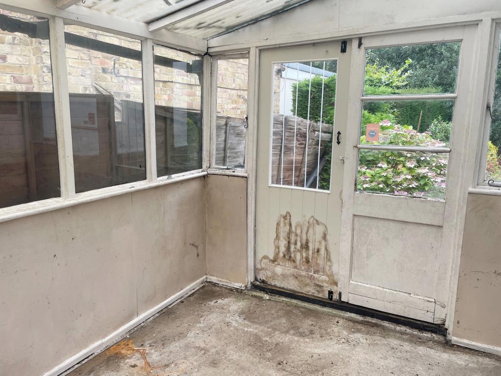 Conservatory to rear with door to garden