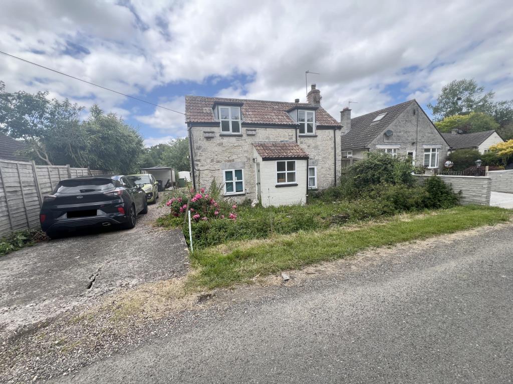 General view of front of property and garden and d