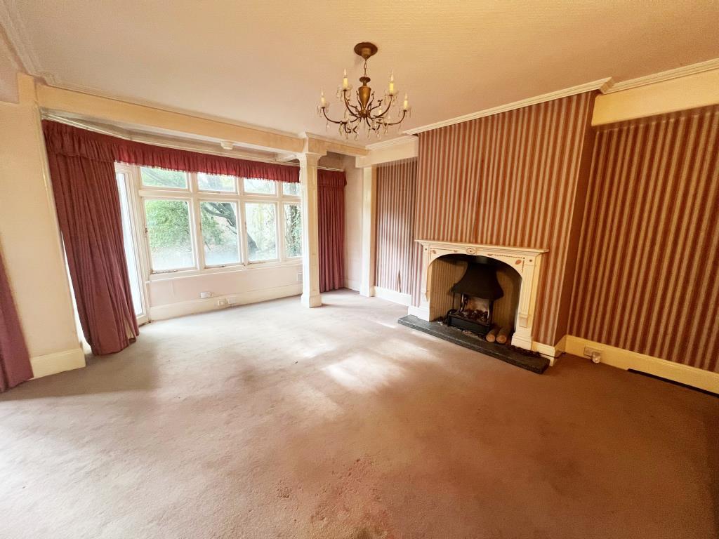 Living room with open fire place
