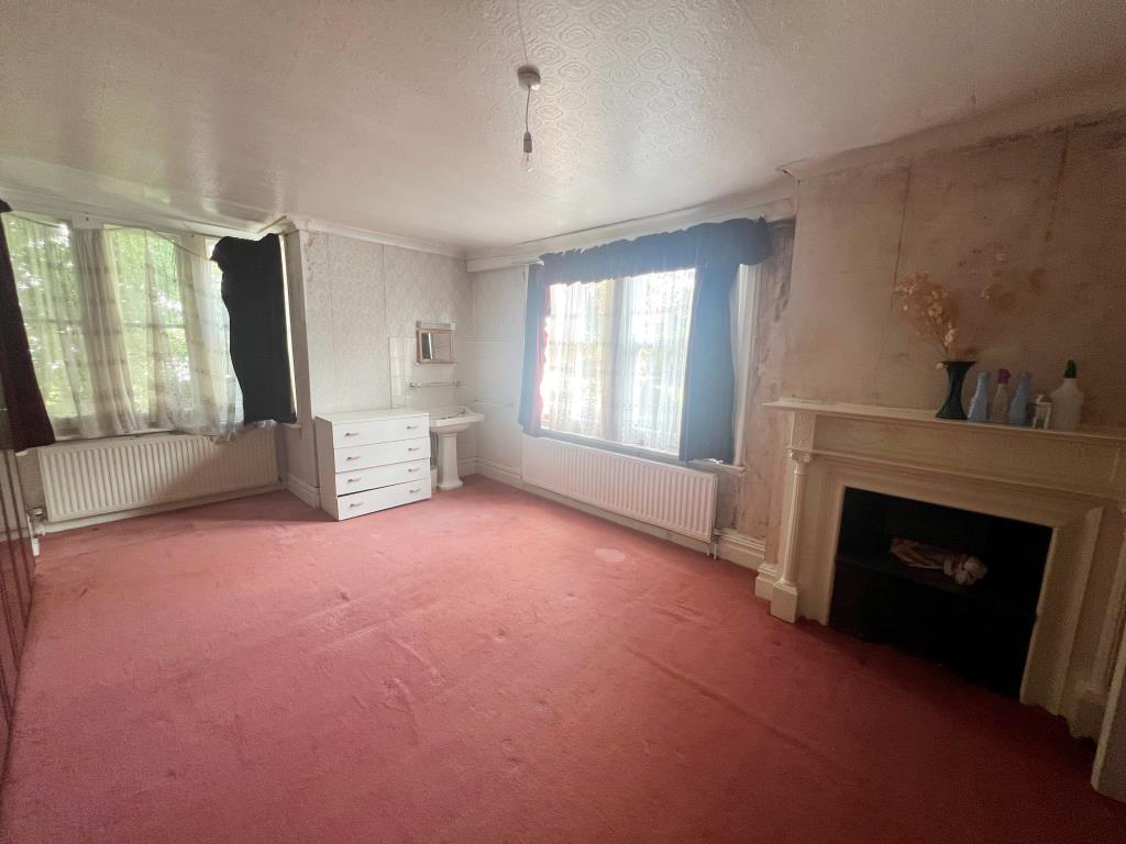 Main bedroom with open fireplace