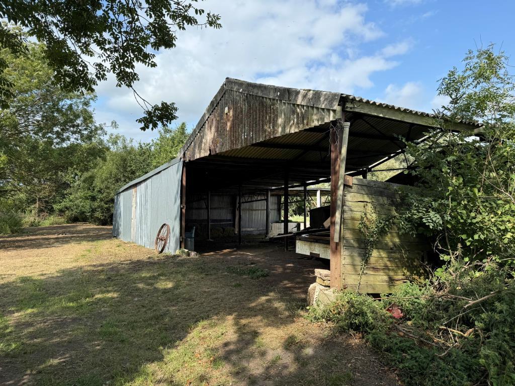 View of One of the Existing Barns