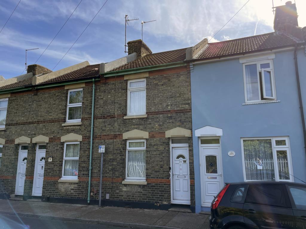 Front view of house in need of refurbishment