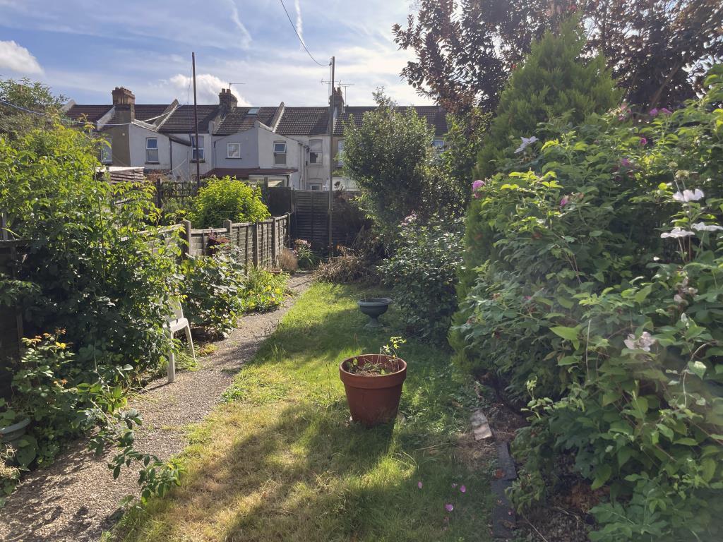 Rear garden at house in need of refurbishment