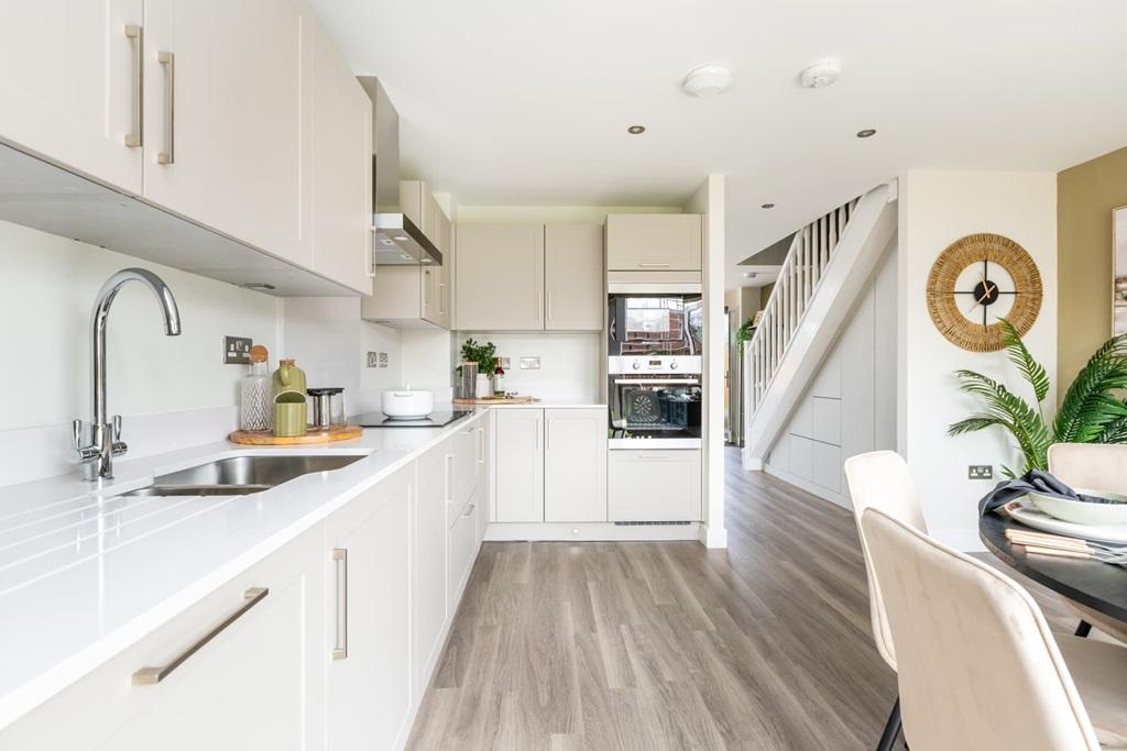 The kitchen provides ample storage space