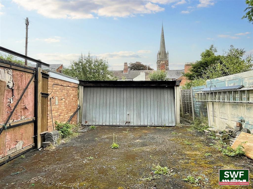 Double garage and driveway