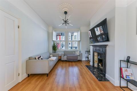 2 Ashcombe Road, London, SW19 8JR