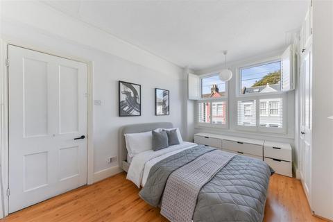 2 Ashcombe Road, London, SW19 8JR