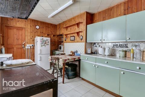 11 Quicks Road, London, SW19 1EZ