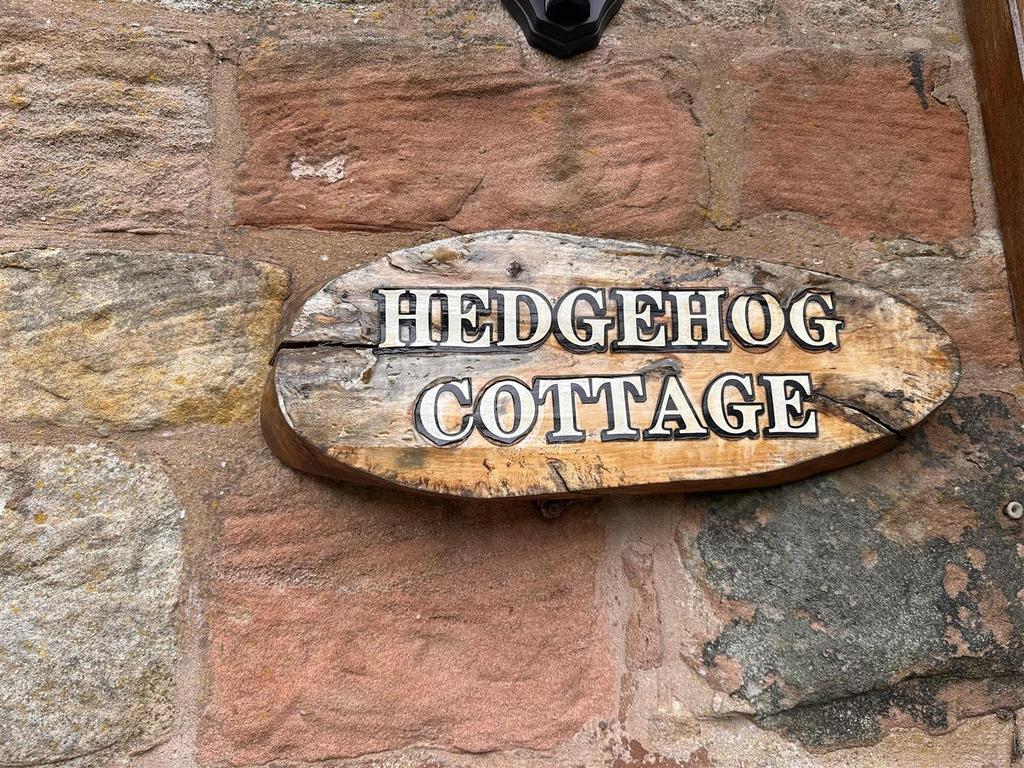 Hedgehog cottage sign.jpg