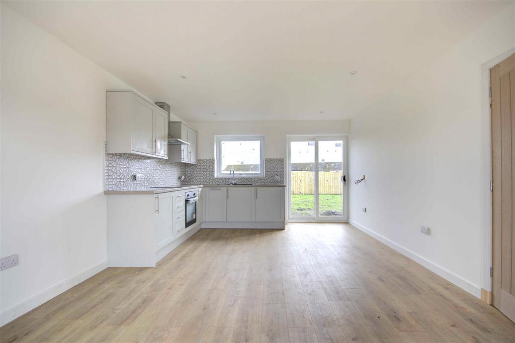 Open plan kitchen dining sitting room