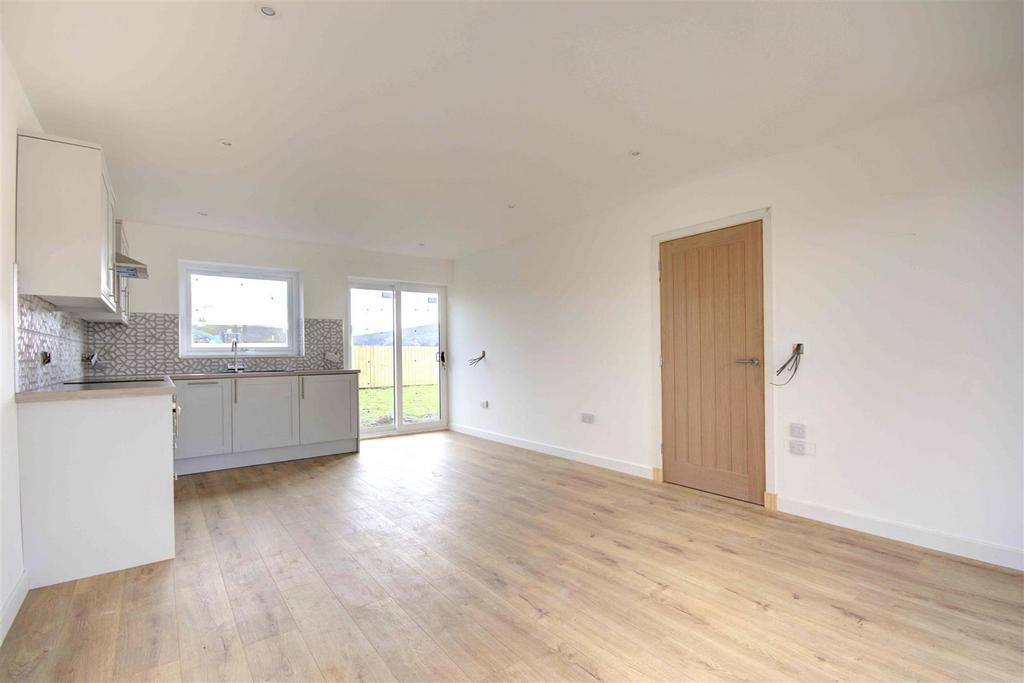 Open plan kitchen dining sitting room