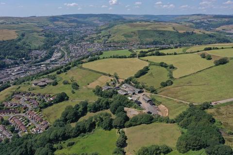 Farm for sale, Y Breuandy, Range of farm buildings and approximately 113.23 acres of land at Llwyncelyn Farm, Porth, CF39 9UE,