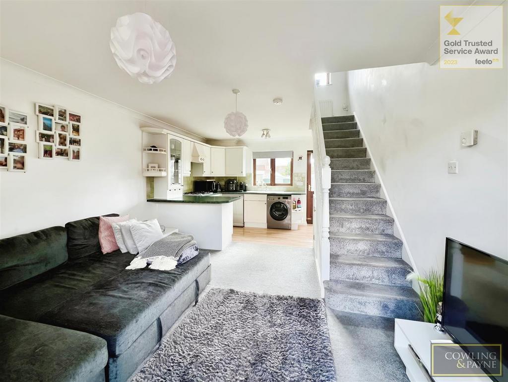 Living room leading to kitchen