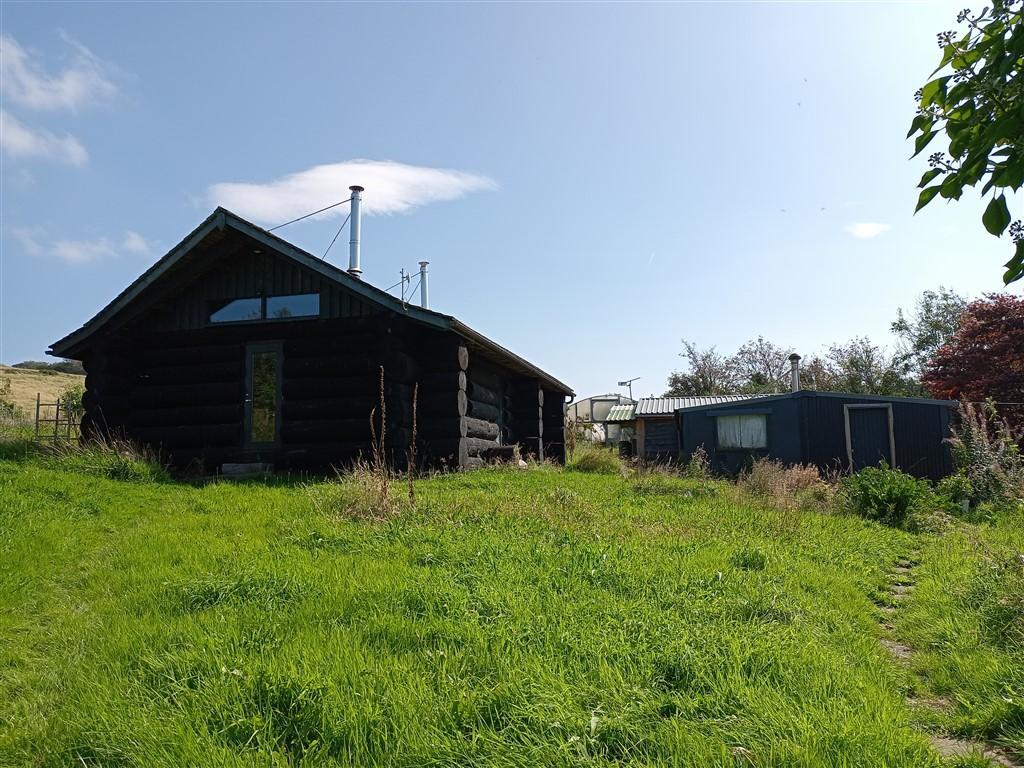 View Of Cabin &amp; Outbuilding