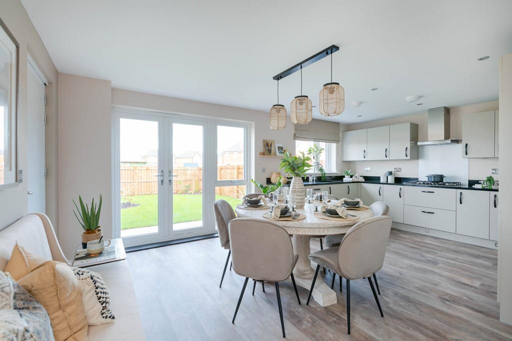 A modern kitchen and dining area