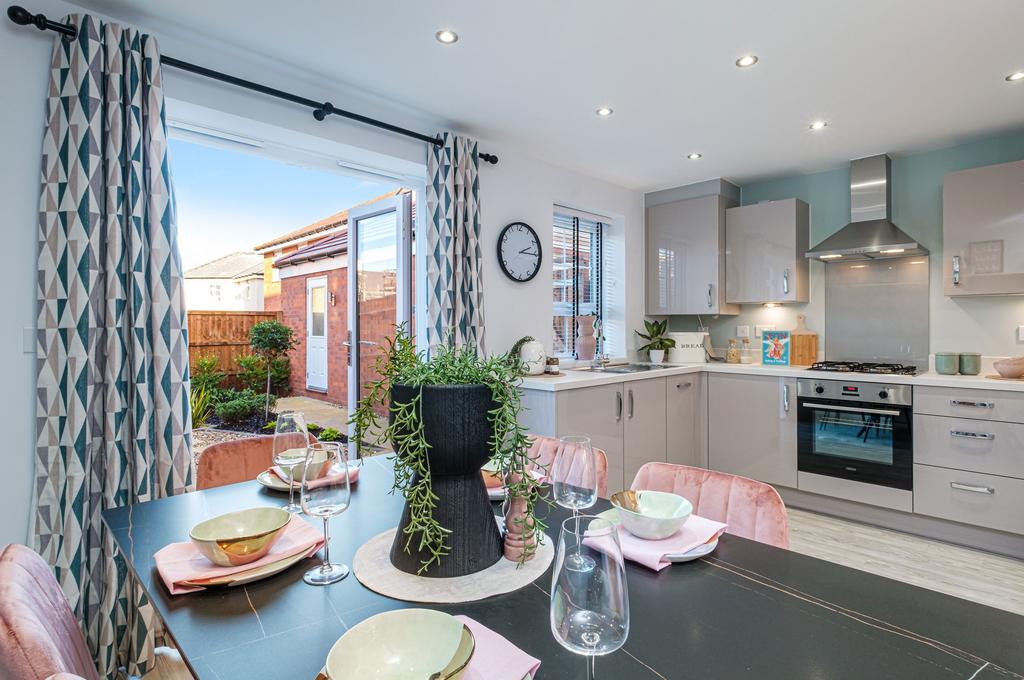 Interior view of the kitchen &amp; dining space in...