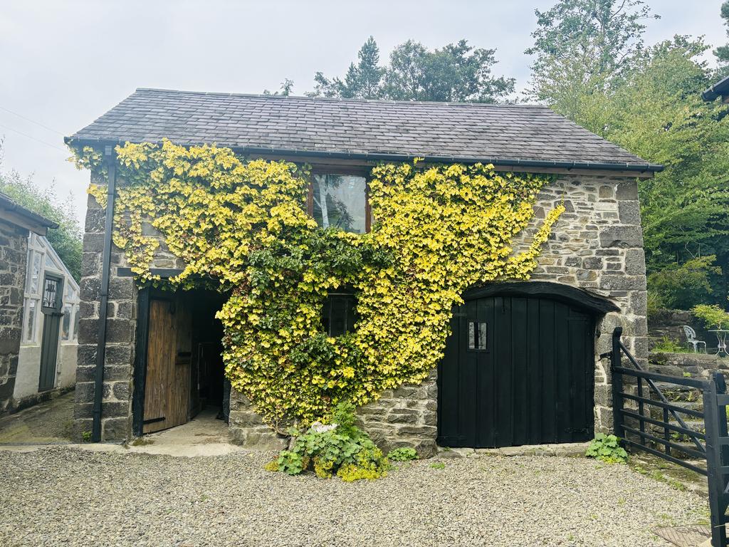 Original cow shed and cart house