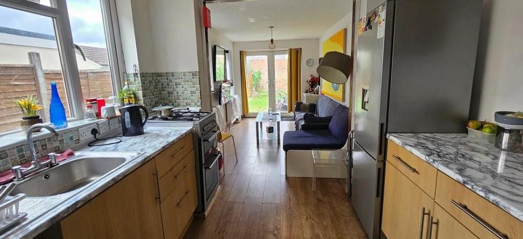 Marble effect worktops in eat in kitchen