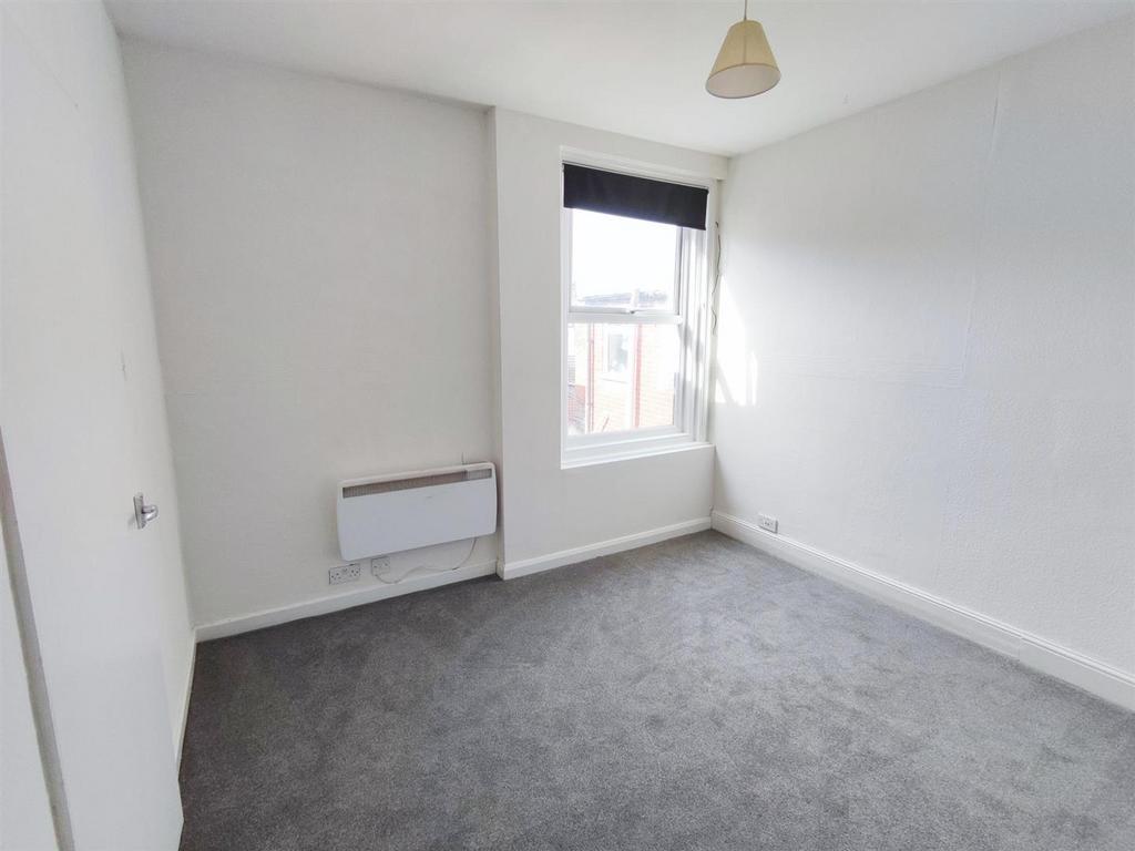 First flr flat 99 Nelson Road Central bedroom.jpg